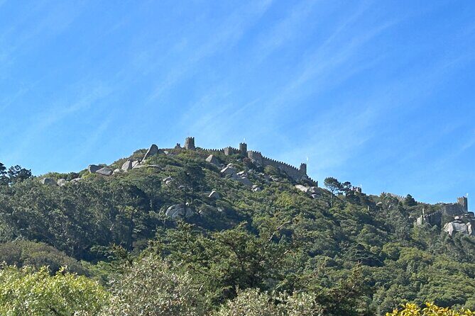 1 Hour Sightseeing Tour in Sintra with Tuktuk - Sintra National Palace: Two Conical Chimneys and a Whole Town Vibe