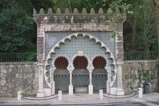 Discover SINTRA<code>s hidden gems on our walking tour – Starting at Sintra’s City Hall: Where You Get Your Bearings’ /><br />
You begin at the Sintra city hall area (2710-523 Sintra). It’s a smart start because it places you in the heart of the action early, before you’re already tired.</p>
<p><p>From there, the walking route heads toward the Centro Histórico de Sintra along a promenade. You’ll notice statues along the way while your guide shares stories, legends, and secret bits tied to the village. Even if you don’t catch every detail, it helps you “read” what you’re seeing—Sintra isn’t just buildings. It’s a place people wrapped in myths long before Instagram existed.</p>
</p>
<p><p>Why it works: a good orientation early on means you don’t spend the rest of the day asking, “Wait, which palace is that?” You’ll be able to connect stops like pieces of the same puzzle.</p>
</p>
<h2 id="centro-historico-and-the-moorish-fountain-stop">Centro Histórico and the Moorish Fountain Stop</h2>
<p><img width="670" height="446" decoding="async" src=