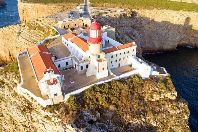 From Lisbon: Algarve Private Tour to Portimao, Lagos and Sagres - Praia da Marinha: clear-water cliffs and a quick photo stop