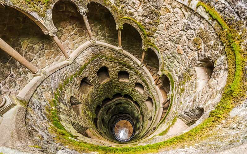From Lisbon: Sintra, Pena Palace and Regaleira Day Trip - Regaleira: Underground Tunnels, Wells, and Garden Mysteries