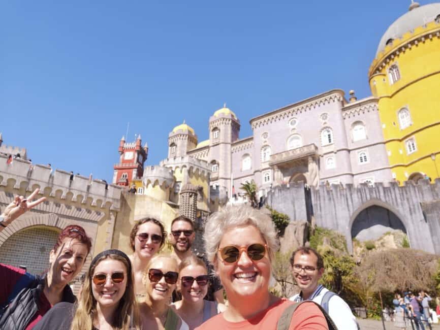 Lisbon: Tour to Pena Palace, Sintra, Cabo da Roca, Cascais - Sintra streets and photo stops: Regaleira, the National Palace area, and the Moorish Castle look