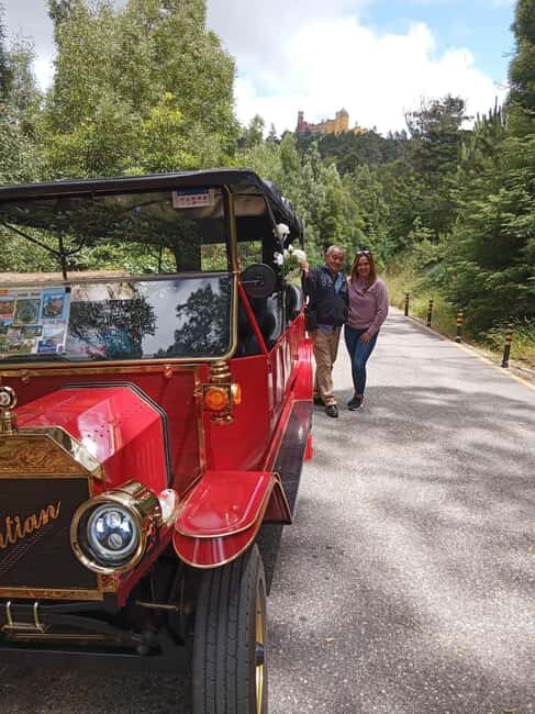 Sintra: Mountain tour by vintage TukTuk - Stop-by-stop: Sintra National Palace photo stop with guided context