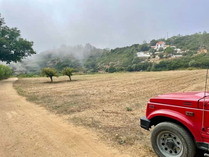 Sintra: Private Full-Day Sintra, Roca, and Cascais 4x4 Tour - Praia do Guincho and Cabo da Roca: Atlantic cliffs with wind in your face